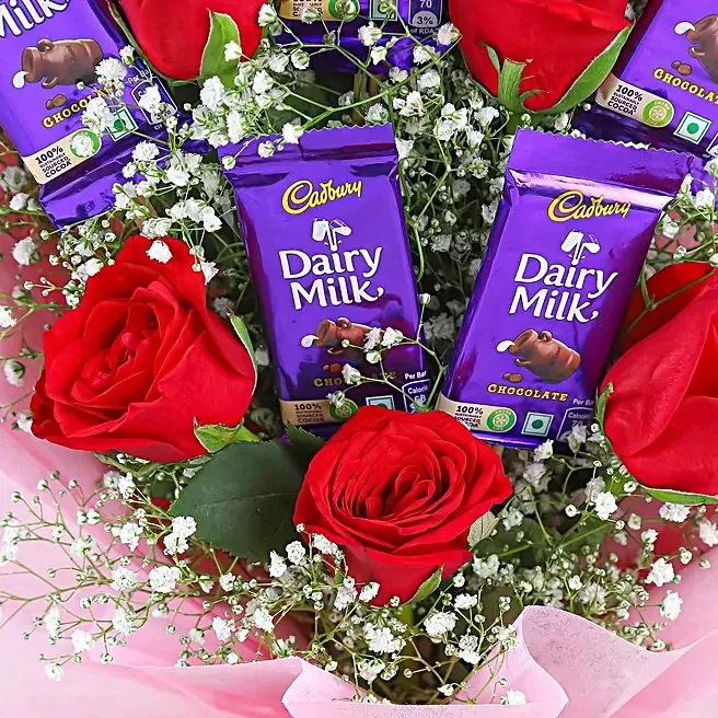 red-roses-bouquet-dairy-milk-chocolates_3.webp